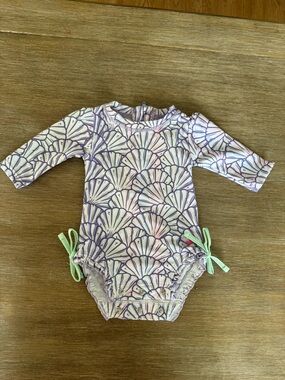 Ruffle Butts Purple and White Shell-Print Long Sleeve One-Piece Swimsuit